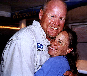 Wayne gets a birthday hug from Lisa.