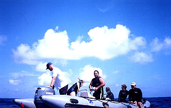 Wayne's boat from the water with Kaiwi looking back.